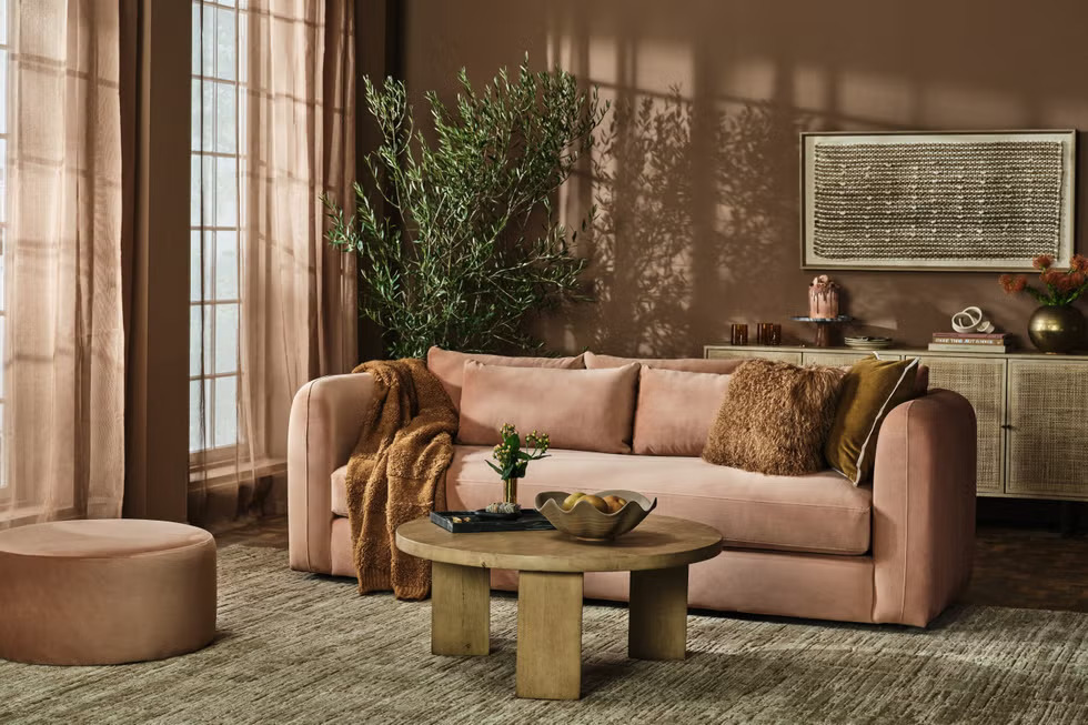 Pantone 2025 Color of the Year: Mocha Mousse, living room setting with mocha mousse sofa and walls.