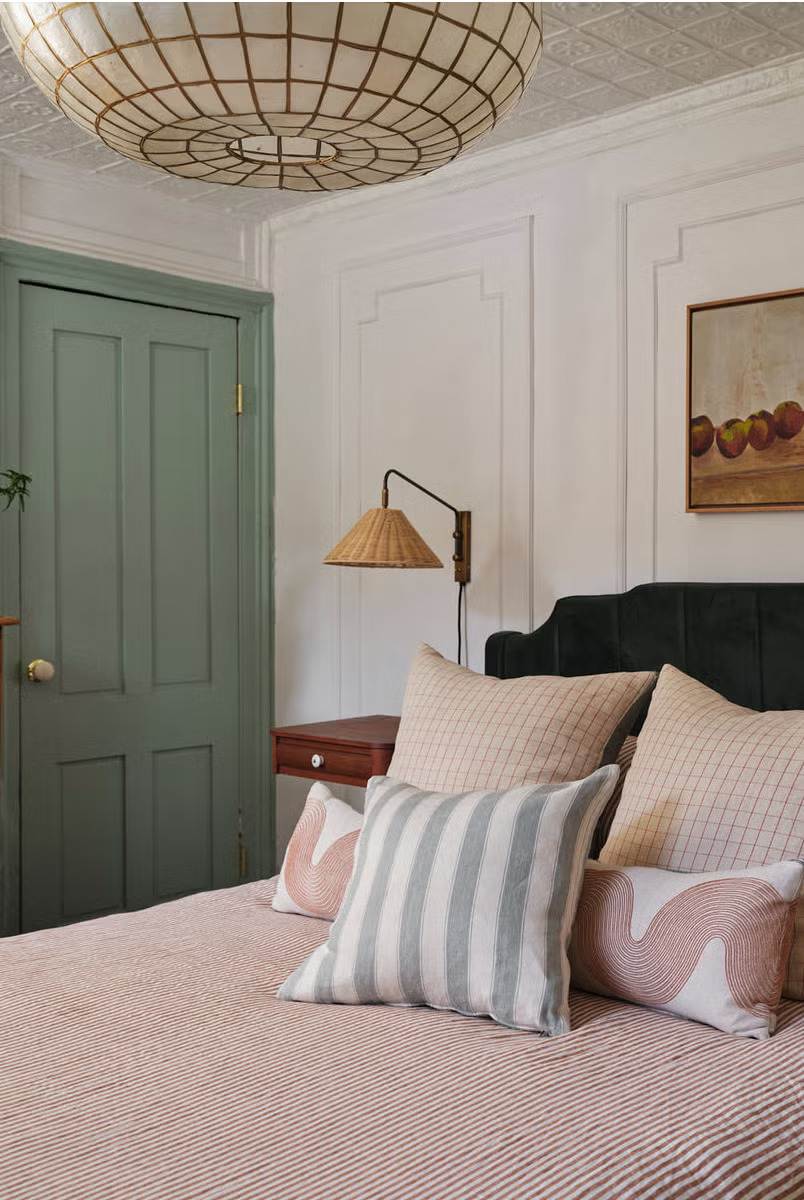 Combining soft neutrals with green, blue, and pink creates an elegant, balanced palette.