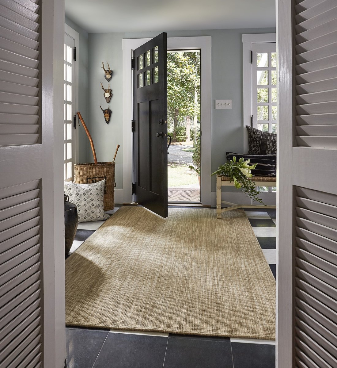 entryway with a rug